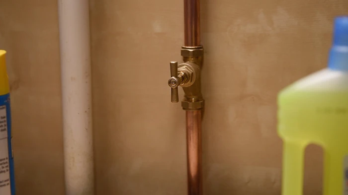 Internal stop tap next to waste pipe