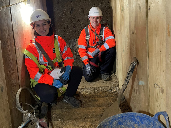 Engineers repairing sewer tunnel